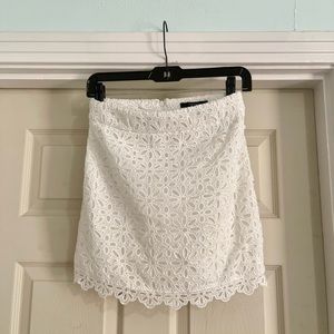 Forever 21 Floral Eyelet Mini Skirt in White. Size Small. Never worn. No tags.